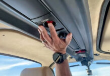 The Safe Return button is in the overhead “surfboard” where it’s accessible to anyone in the cabin.